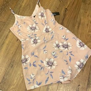 Floral romper from Lulu’s. Never been worn! Tags still attached